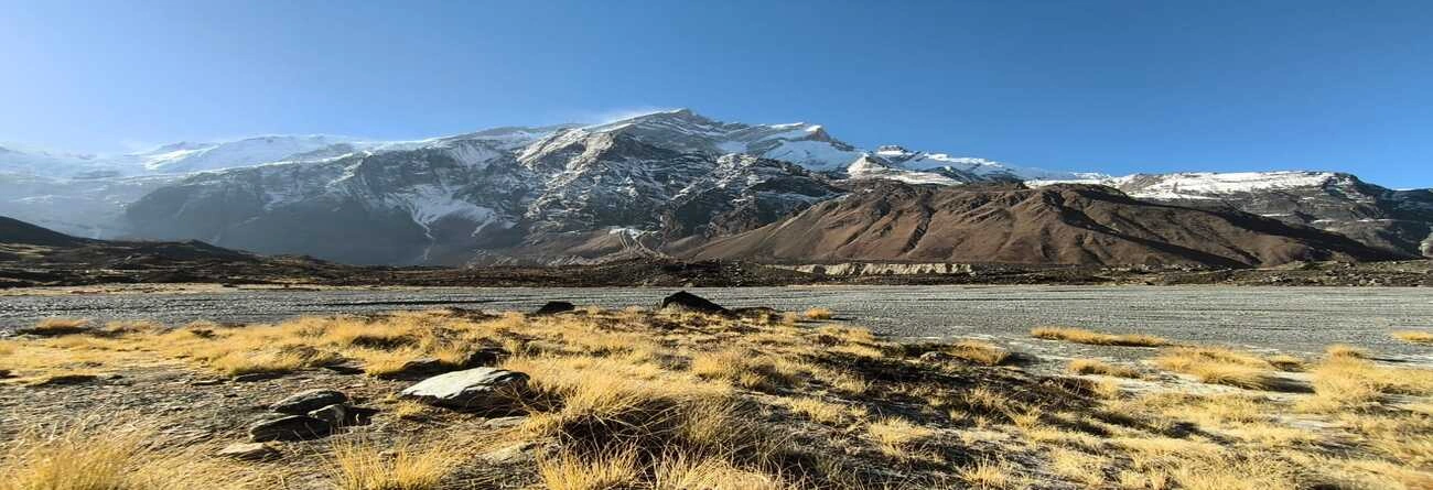 Snow-capped Manaslu mountains under clear blue sky