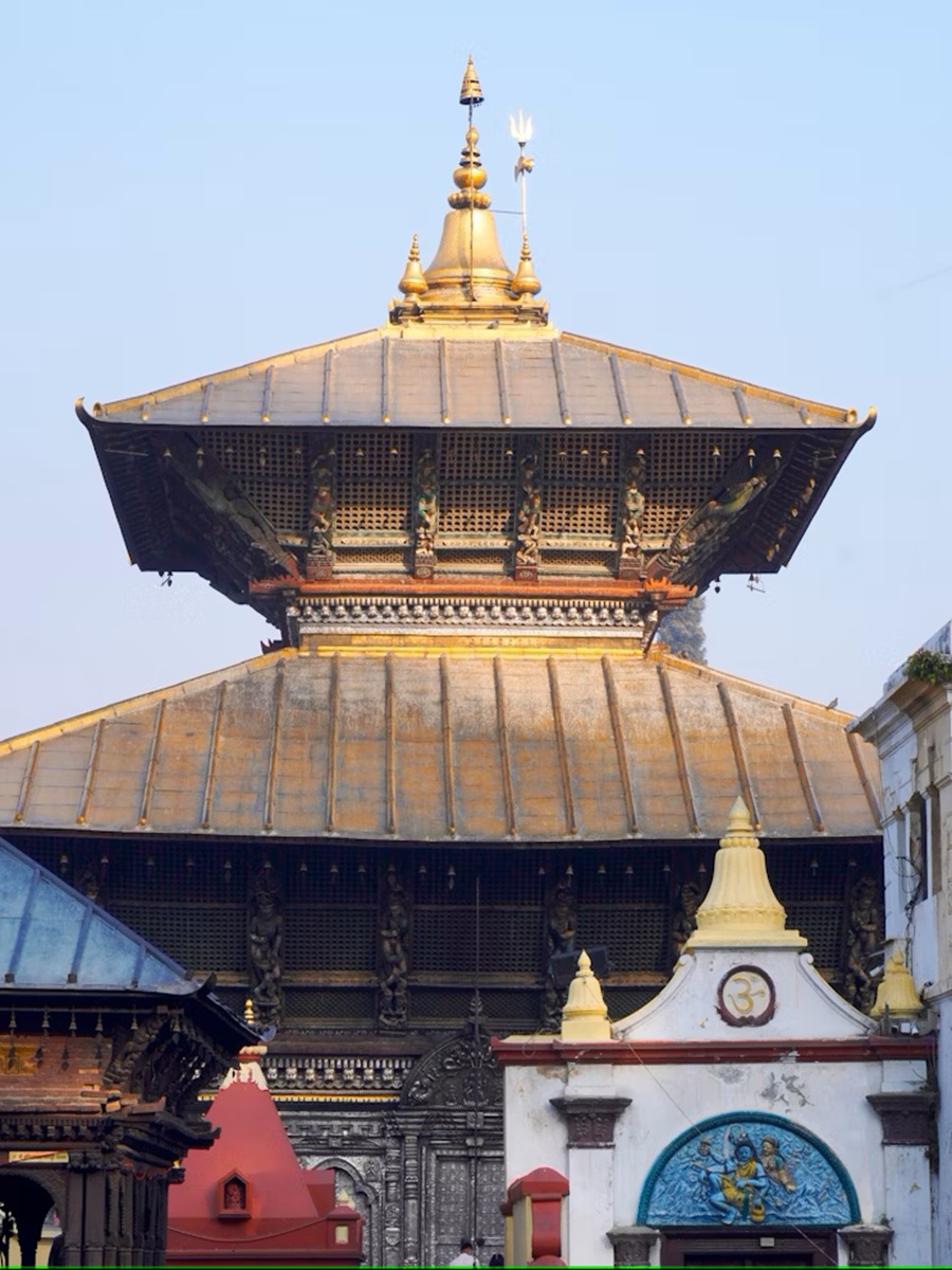main sanctum of pashupatinath temple with golden spire and ancient wood carvings